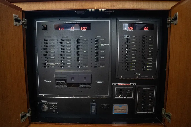 Slide: The Image of Electrical panel of a 2000 Viking 50 Conv Sport Fisher boat. - 13