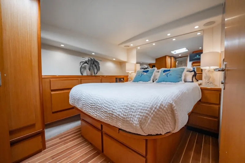 Slide: The Image of Luxurious bedroom interior of 2000 Viking 50 Conv Sport Fisher yacht. - 22