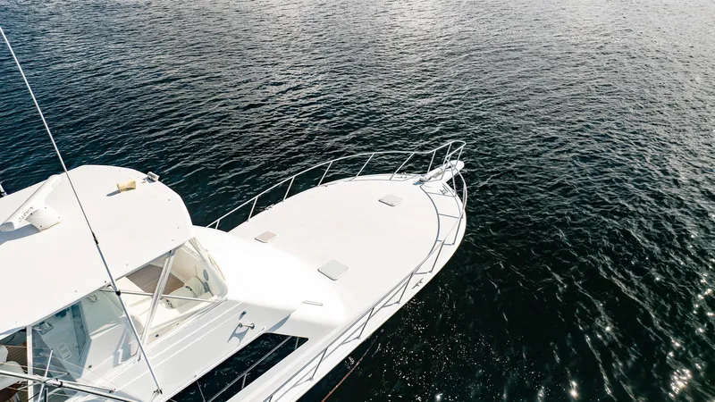 Slide: The Image of Viking 50 Conv Sport Fisher 2000 on calm water, aerial view. - 37