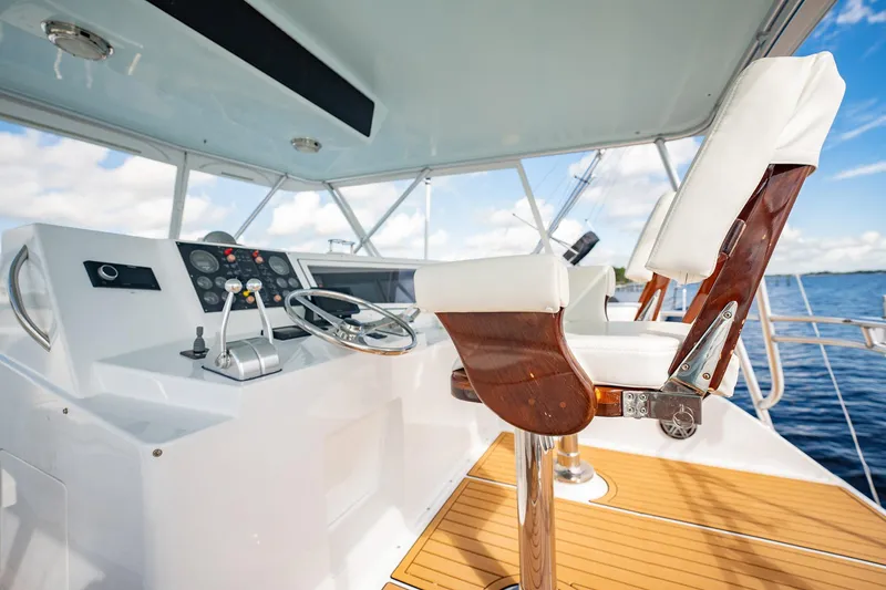 Slide: The Image of Interior of 2000 Viking 50 Conv Sport Fisher yacht with helm and captain's chair. - 5
