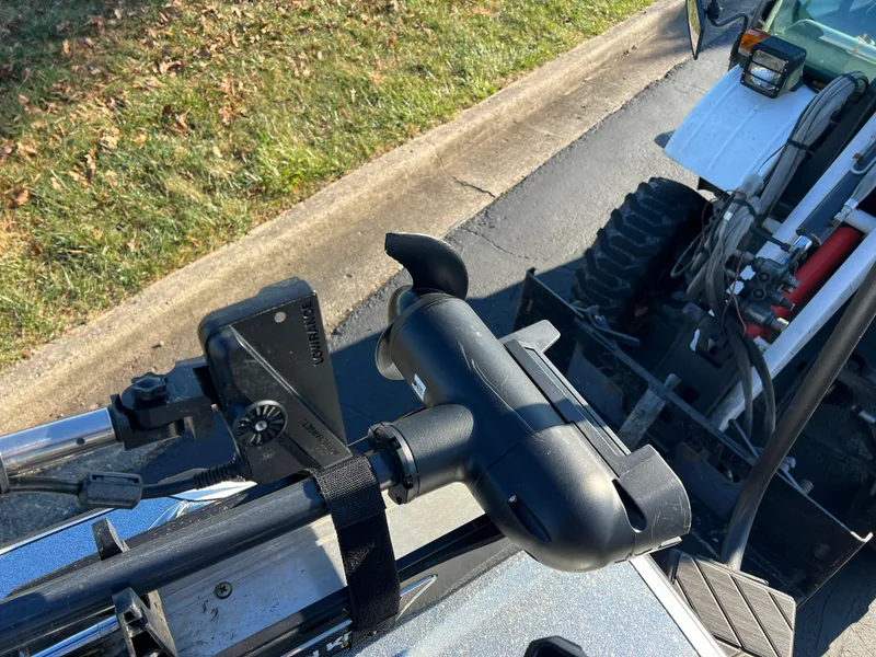 Slide: The Image of Close-up of 2024 Vexus VXS20 boat equipment with a vehicle in the background. - 16