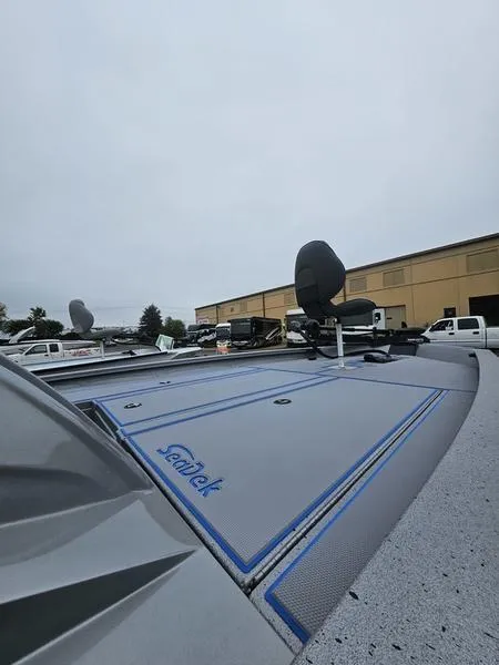 Slide: The Image of 2025 Xpress H20 Bass boat deck with control panel and foot pedal. - 11