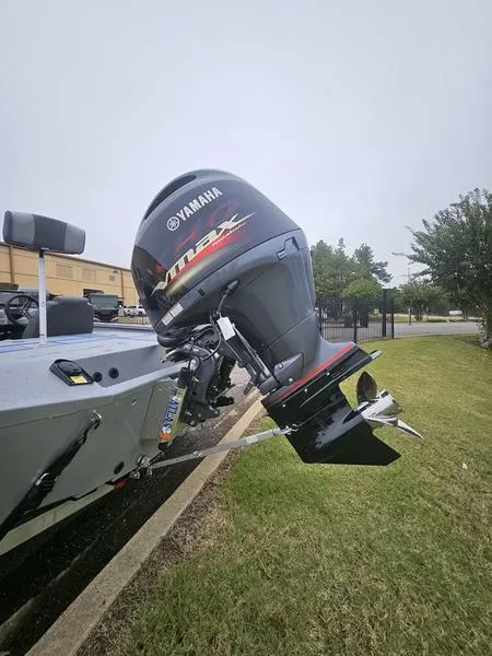 Slide: The Image of 2025 Xpress H20 Bass boat interior with seating and steering console. - 3