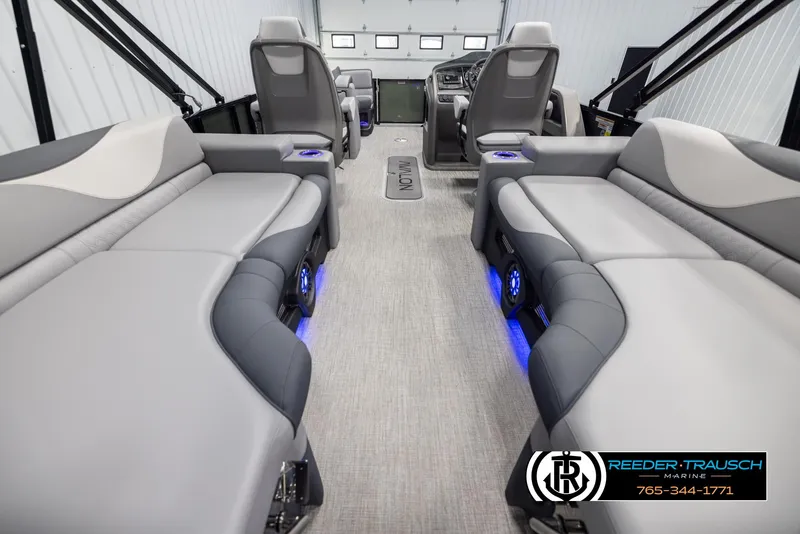 Slide: The Image of Interior of 2025 Avalon LSZ QLS boat with modern seating and blue LED lighting. - 16