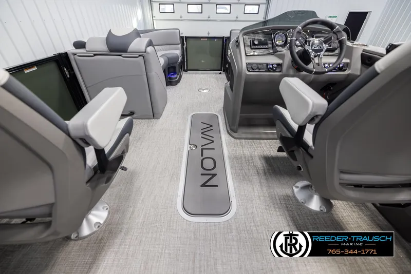Slide: The Image of 2025 Avalon LSZ QLS boat interior with modern seating and control panel. - 17