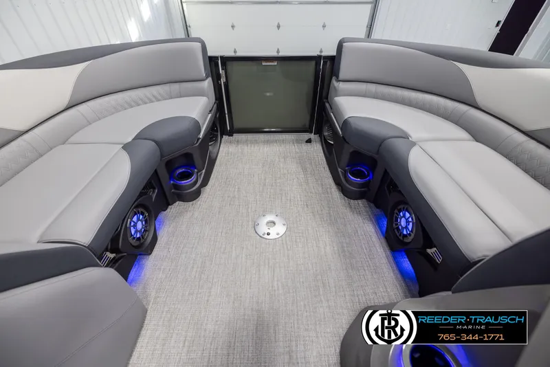 Slide: The Image of 2025 Avalon LSZ QLS interior with gray seating and blue LED lighting. - 18