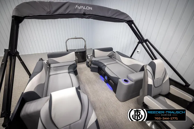 Slide: The Image of 2025 Avalon LSZ QLS pontoon boat interior with modern seating and canopy. - 24