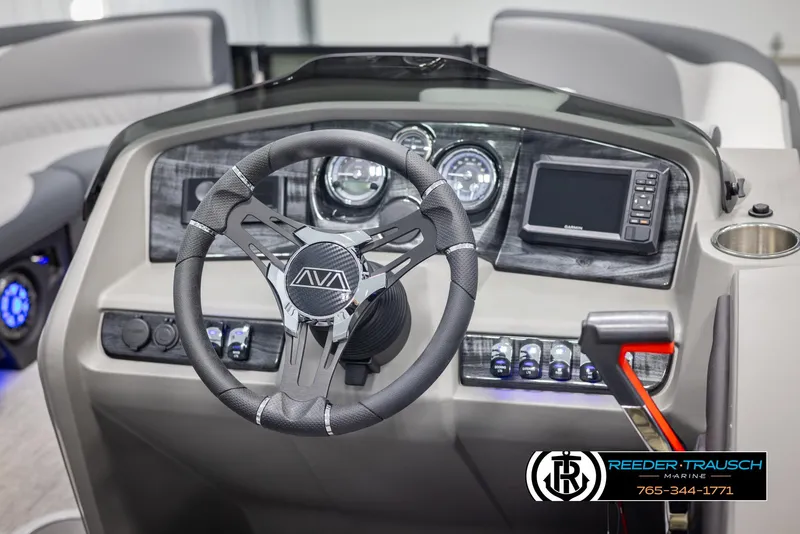 Slide: The Image of 2025 Avalon LSZ QLS boat dashboard with steering wheel and control panel. - 26