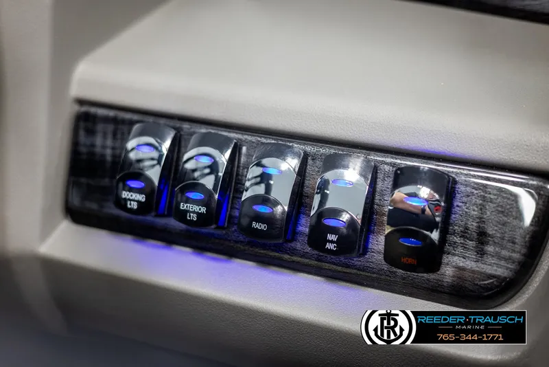 Slide: The Image of Control panel of 2025 Avalon LSZ QLS with illuminated switches for various functions. - 35