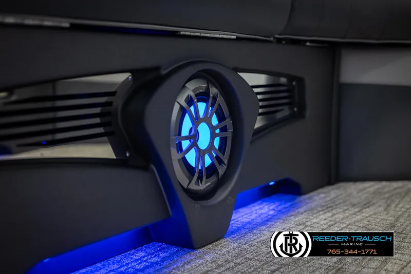 Slide: The Image of 2025 Avalon LSZ QLS interior with illuminated speaker and blue ambient lighting. - 38