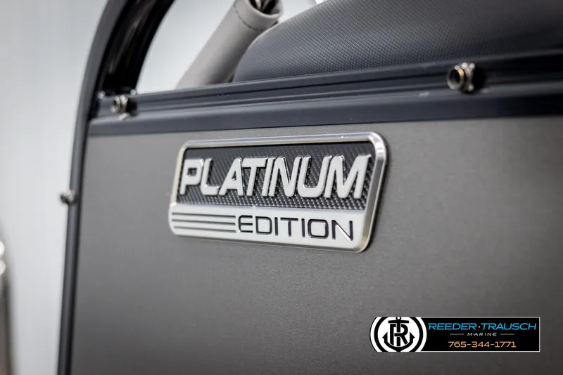 Slide: The Image of 2025 Avalon LSZ QLS Platinum Edition badge on vehicle interior. - 46