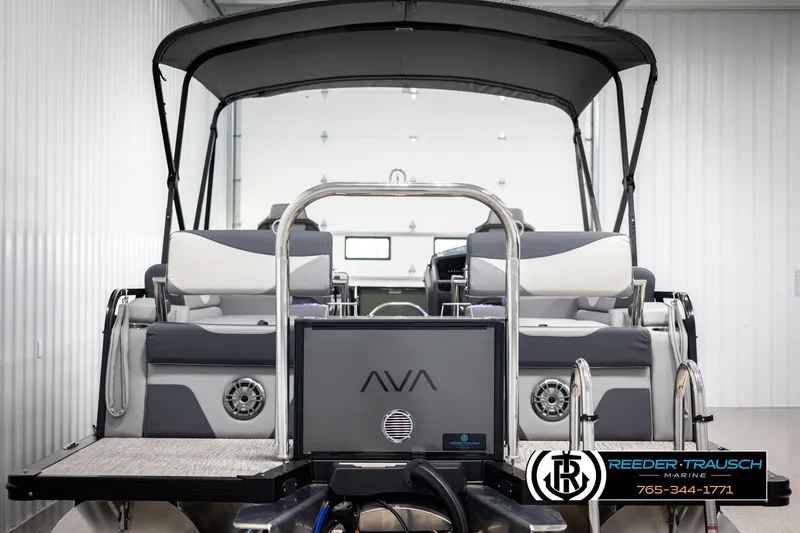 Slide: The Image of 2025 Avalon LSZ QLS pontoon boat with canopy in showroom. - 8