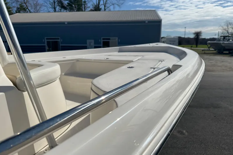 Slide: The Image of 2026 Bulls Bay 2200 XS boat deck with sleek railing and seating. - 15