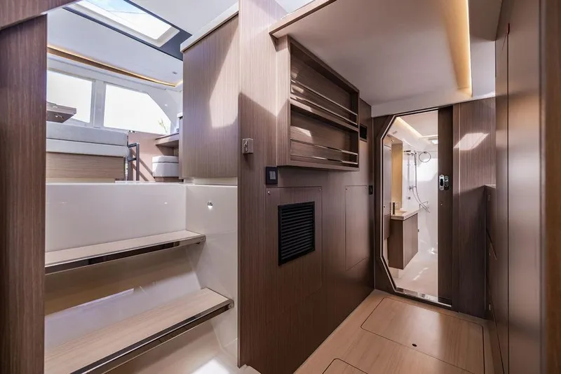 Slide: The Image of Interior of 2024 Leopard 45 yacht, featuring modern wood finishes and sleek design. - 10