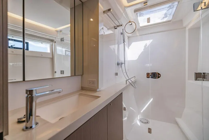 Slide: The Image of Modern bathroom in 2024 Leopard 45 yacht with sleek fixtures and skylight. - 12