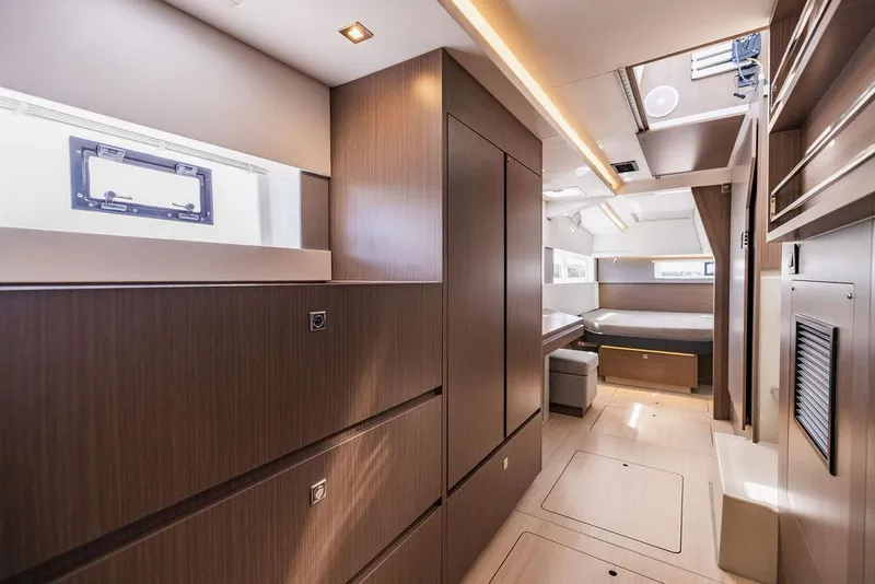 Slide: The Image of Luxurious interior of 2024 Leopard 45 yacht with modern wood finishes and ample natural light. - 18