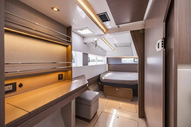 Slide: The Image of Luxurious interior of 2024 Leopard 45 yacht with modern design and cozy sleeping area. - 19