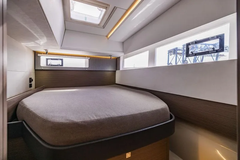 Slide: The Image of Luxurious cabin interior of 2024 Leopard 45 yacht with modern design and ample natural light. - 24