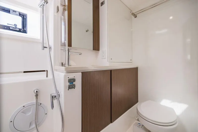 Slide: The Image of Modern bathroom in 2024 Leopard 45 yacht with sleek fixtures and wood accents. - 27
