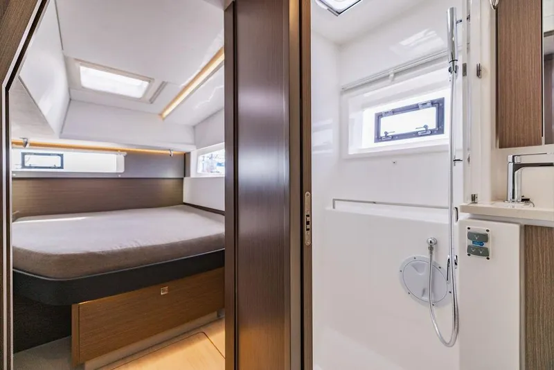 Slide: The Image of 2024 Leopard 45 yacht interior with modern bedroom and bathroom design. - 29