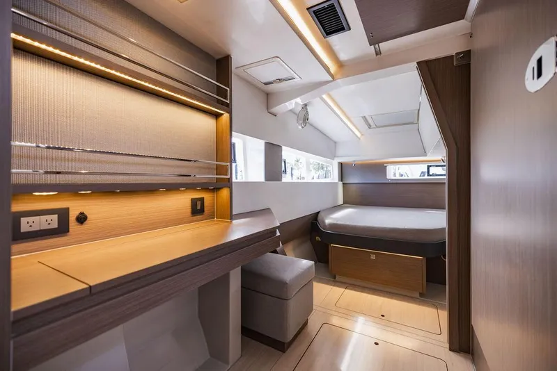 Slide: The Image of Luxurious interior of 2024 Leopard 45 yacht with modern design and cozy sleeping area. - 3