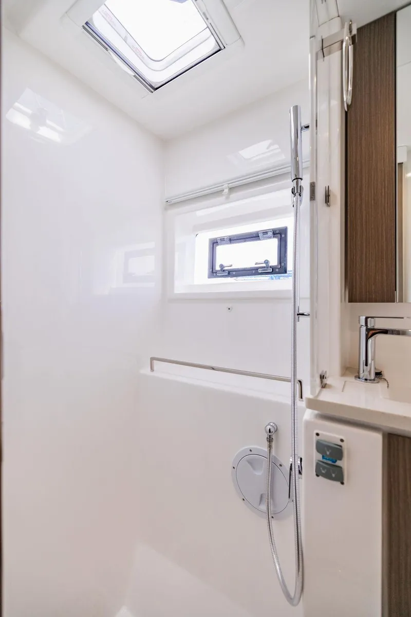 Slide: The Image of 2024 Leopard 45 yacht bathroom with skylight and modern fixtures. - 33