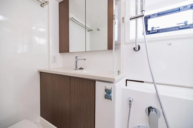 Slide: The Image of Modern bathroom in 2024 Leopard 45 yacht with sleek fixtures and wood cabinetry. - 38