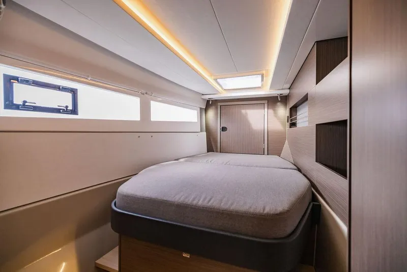 Slide: The Image of Luxurious cabin interior of 2024 Leopard 45 yacht with modern design and ambient lighting. - 42