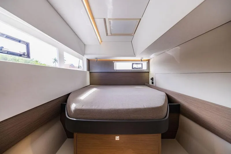 Slide: The Image of 2024 Leopard 45 yacht interior cabin with modern design and comfortable bed. - 5