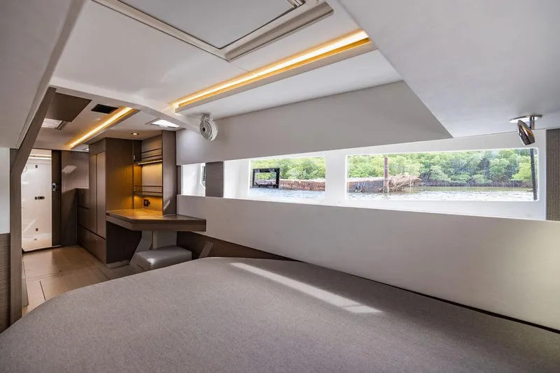 Slide: The Image of Luxurious interior of 2024 Leopard 45 yacht with modern design and scenic window views. - 7