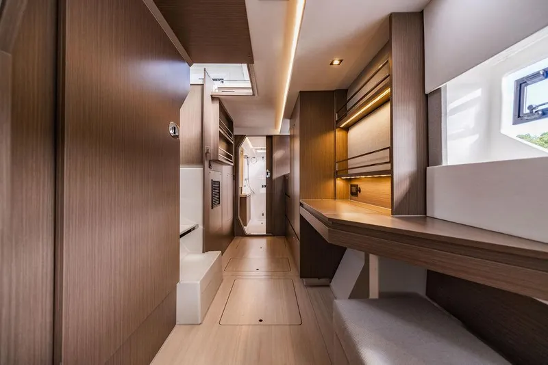 Slide: The Image of Luxurious interior of 2024 Leopard 45 yacht, featuring modern wood finishes and ample natural light. - 9