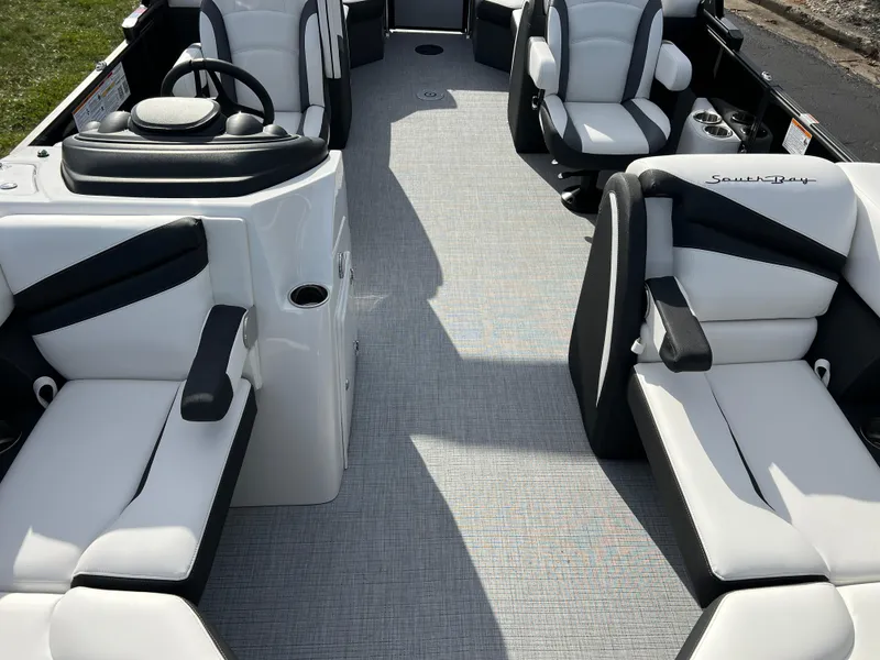 Slide: The Image of 2025 South Bay 222RS boat interior with luxurious seating and modern design. - 11