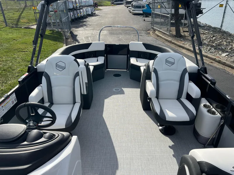 Slide: The Image of 2025 South Bay 222RS pontoon boat interior with plush seating and modern design. - 12