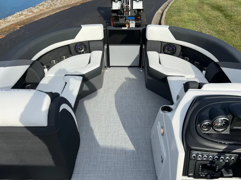 Slide: The Image of 2025 South Bay 222RS pontoon boat interior with modern seating and dashboard. - 26