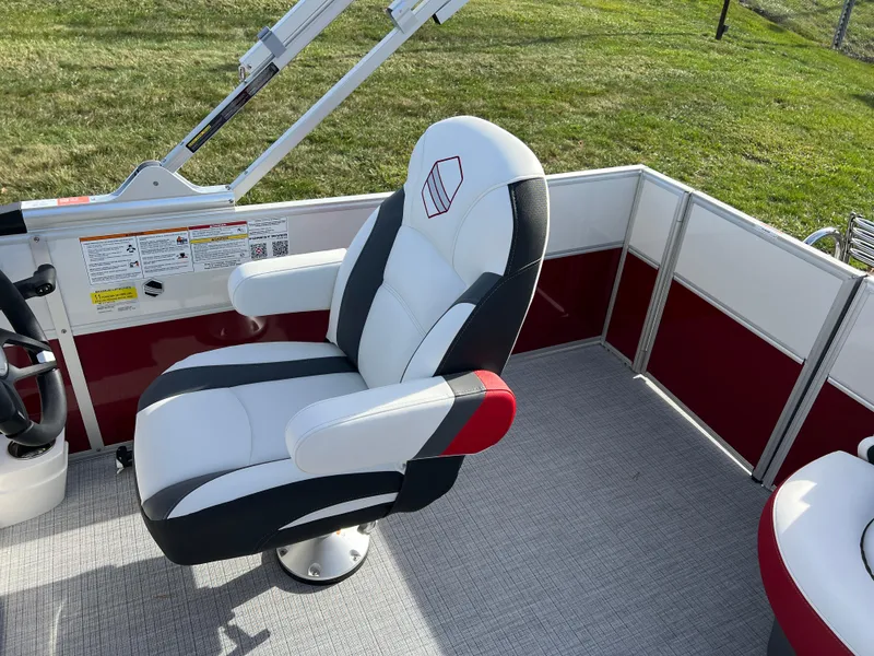 Slide: The Image of 2025 South Bay S 220 CR2 boat seat with red and white upholstery. - 14