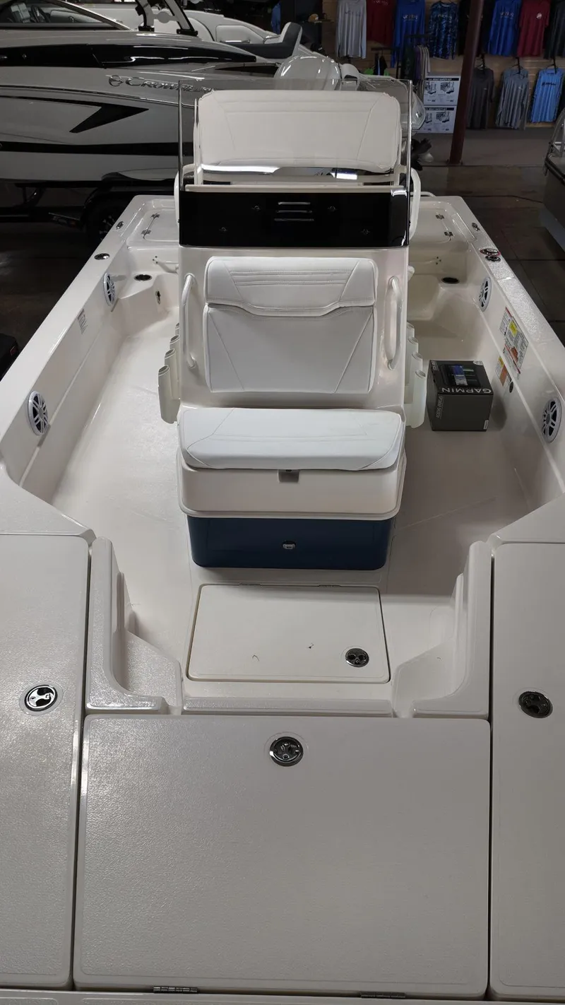 Slide: The Image of 2025 Skeeter SX 221 boat interior with seating and storage compartments. - 6