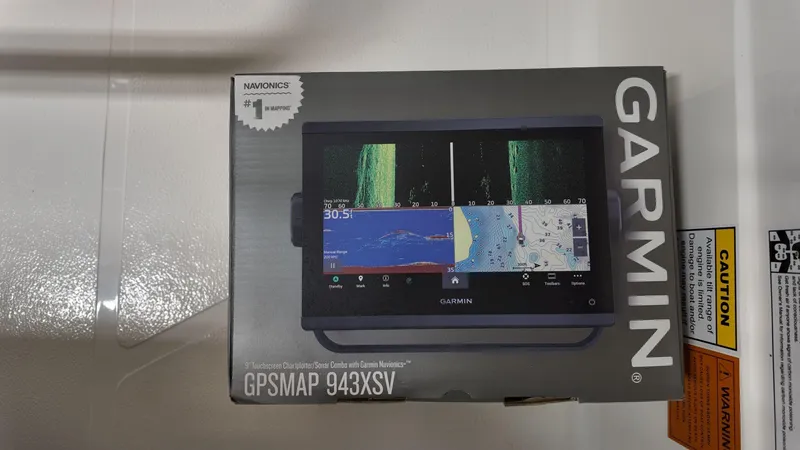 Slide: The Image of Garmin GPSMAP 943XSV box on 2025 Skeeter SX 221 boat. - 7