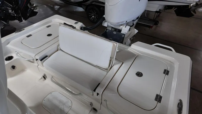 Slide: The Image of 2025 Skeeter SX 221 boat interior with storage compartments and seating. - 8
