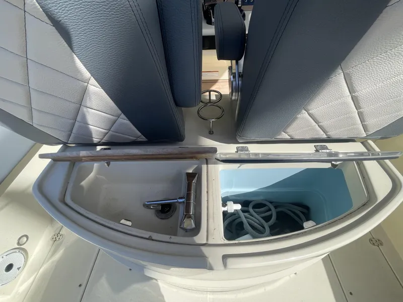 Slide: The Image of 2021 Chris-Craft Catalina 30 interior seating and storage compartment. - 6