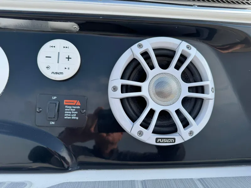 Slide: The Image of 2025 Regal LS4 Surf boat speaker system with control panel and Fusion branding. - 16