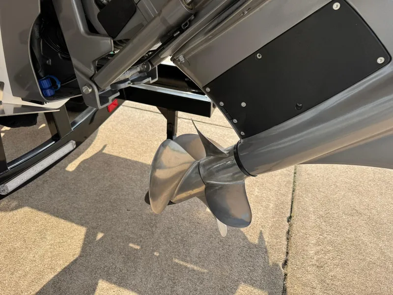 Slide: The Image of 2025 Regal LS4 Surf boat propeller and drive system on a trailer. - 17