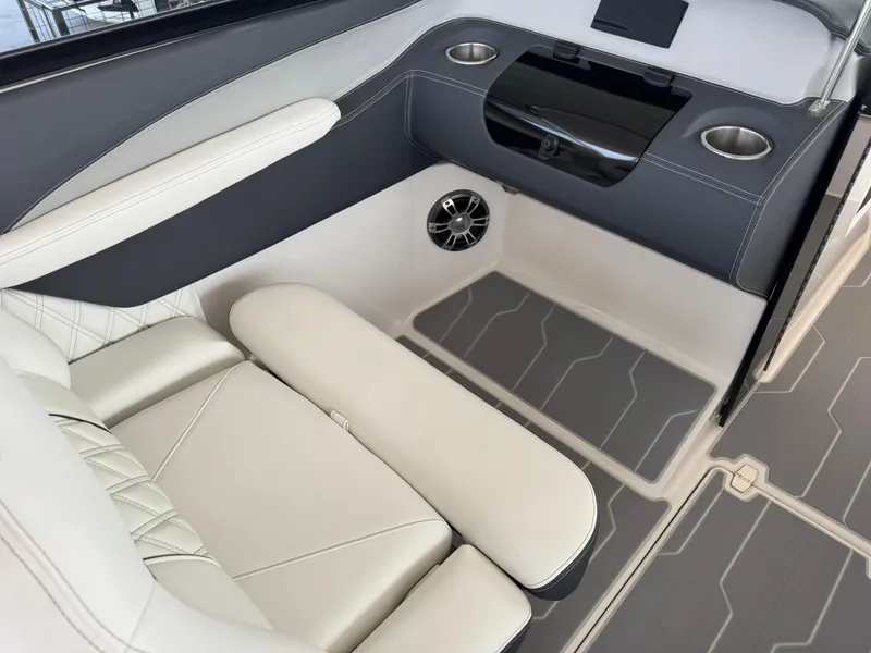 Slide: The Image of 2025 Regal LS4 Surf boat interior with luxurious seating and modern design. - 25