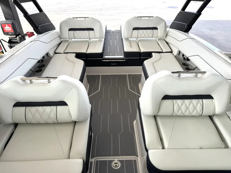 Slide: The Image of 2025 Regal LS4 Surf boat interior with luxurious seating and modern design. - 36