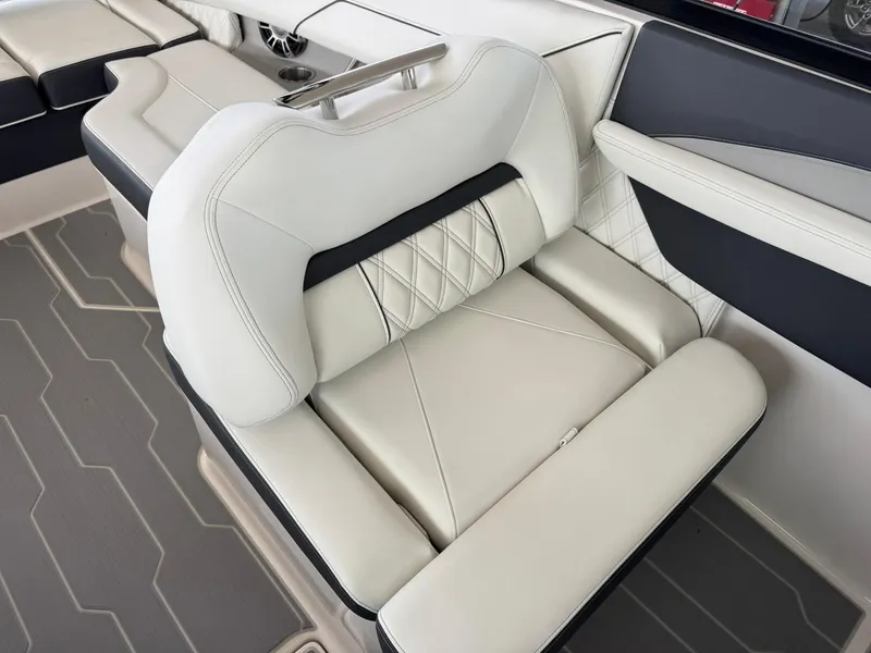 Slide: The Image of 2025 Regal LS4 Surf boat interior with luxurious white seating and modern design. - 37