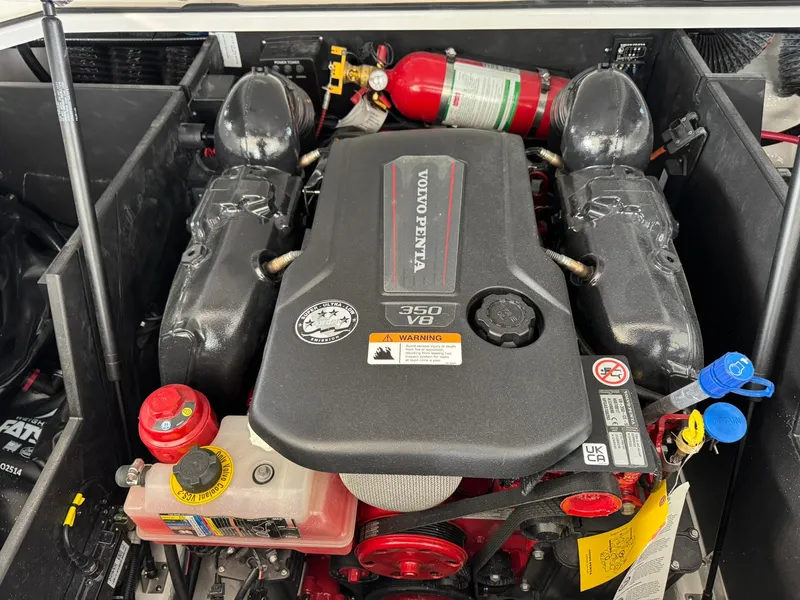 Slide: The Image of 2025 Regal LS4 Surf engine compartment with Volvo Penta 350 V8 engine. - 41