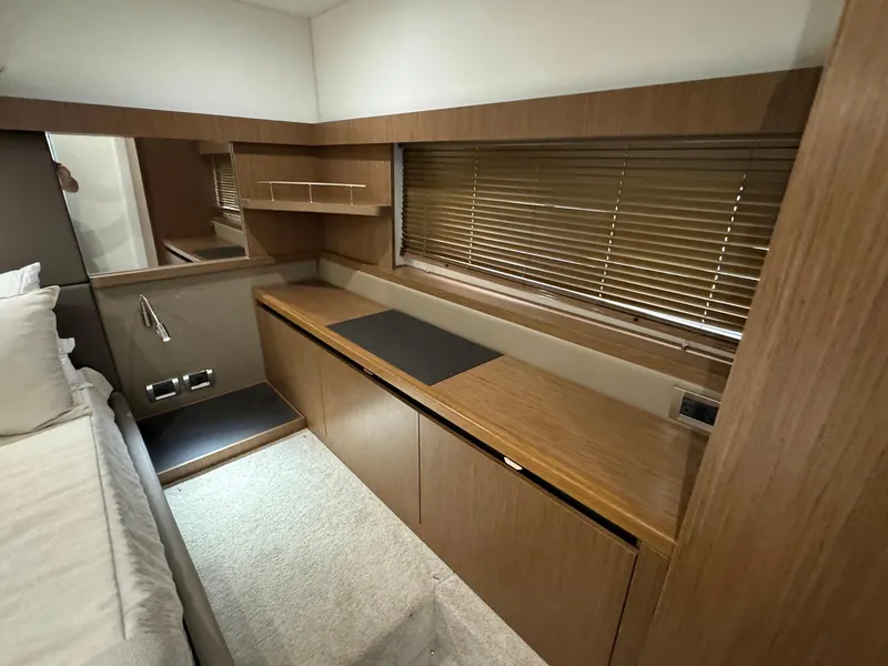 Slide: The Image of Interior of 2017 Sea Ray Sundancer 460 yacht with wooden cabinetry and modern design. - 20