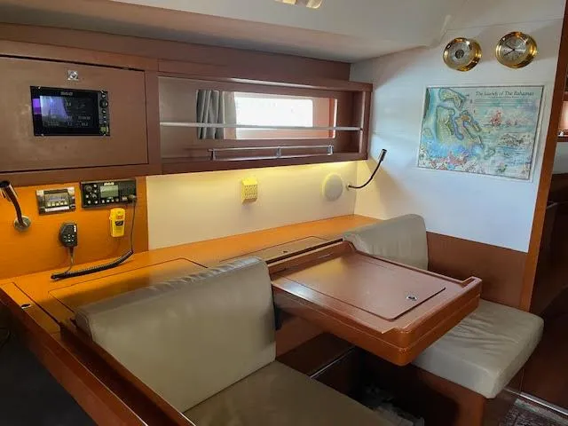 Slide: The Image of 2016 Beneteau Oceanis 45 bathroom with wooden cabinetry and modern fixtures. - 21
