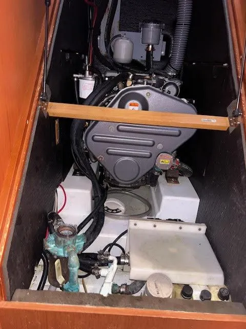 Slide: The Image of Engine compartment of a 2016 Beneteau Oceanis 45 sailboat, featuring a Yanmar engine. - 29