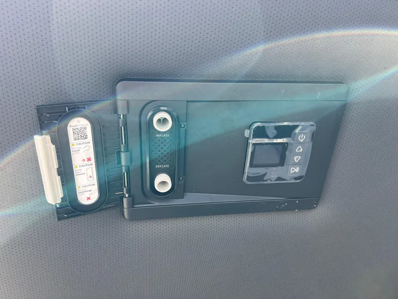 Slide: The Image of Control panel of 2025 South Bay S 220CR2 boat with QR code and buttons. - 14