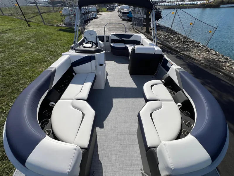 Slide: The Image of 2025 South Bay S 220CR2 pontoon boat with spacious seating and modern design. - 8